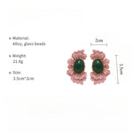 Load image into Gallery viewer, Oval Glass Bead Earrings Floral Motif S5P108