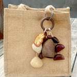Load image into Gallery viewer, Handcrafted Seed Pod Wind Chime Bag Charm Maillard N6F309