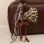 Load image into Gallery viewer, Leopard Heart Bow Woven Rope Bag Charm Keychain S5P928