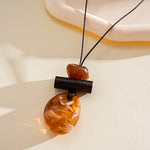 Load image into Gallery viewer, Leather Cord Ombré Resin Geometric Drop Necklace N6H141