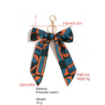 Load image into Gallery viewer, Satin Bow Geometric Pattern Keychain Bag Charm N6G116