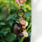 Load image into Gallery viewer, Warm Tone Acorn Shell Keychain Handmade Bag Charm N6F310