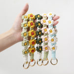 Load image into Gallery viewer, Daisy Flower Keychain Handwoven Wristlet Spring Coil N6G040