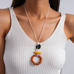 Load image into Gallery viewer, Leather Cord Resin Wood Round Pendant Necklace N6H140