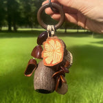 Load image into Gallery viewer, Handcrafted Seed Pod Wind Chime Bag Charm Maillard N6F309