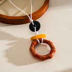 Load image into Gallery viewer, Leather Cord Resin Wood Round Pendant Necklace N6H140