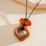 Load image into Gallery viewer, Leather Cord Ombré Resin Geometric Drop Necklace N6H141