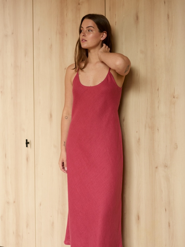 Image 1 of DIORA bias-cut linen slip dress with spaghetti straps and midi length, elegant evening wear from ALBERALKIRK | Raspberry Color