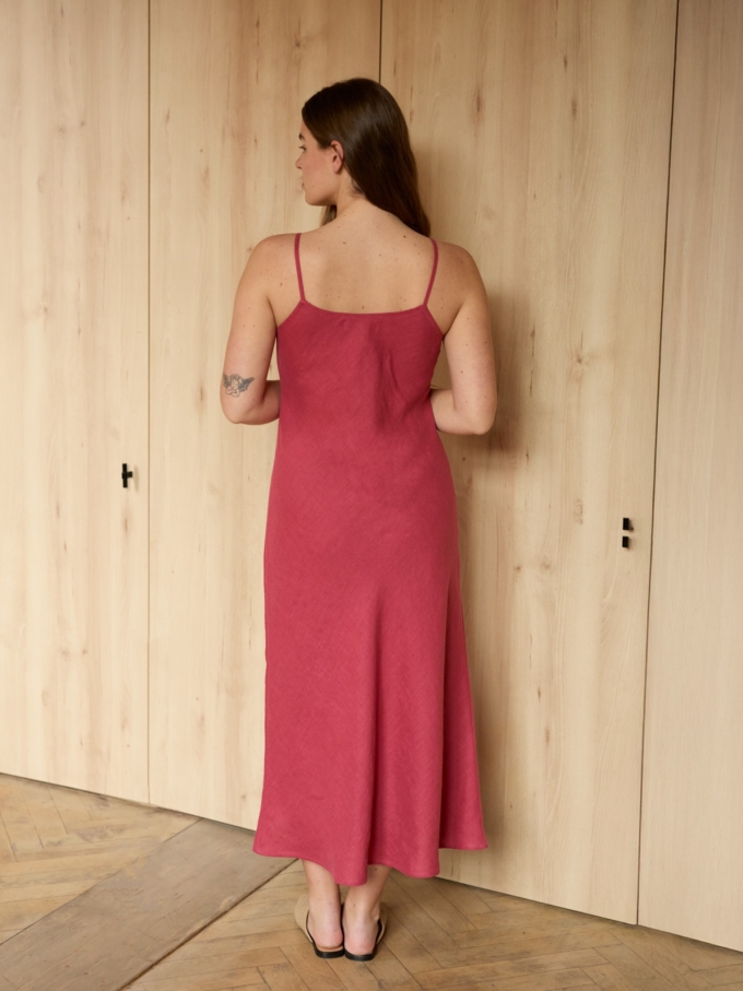 Image 6 of DIORA bias-cut linen slip dress with spaghetti straps and midi length, elegant evening wear from ALBERALKIRK | Raspberry Color