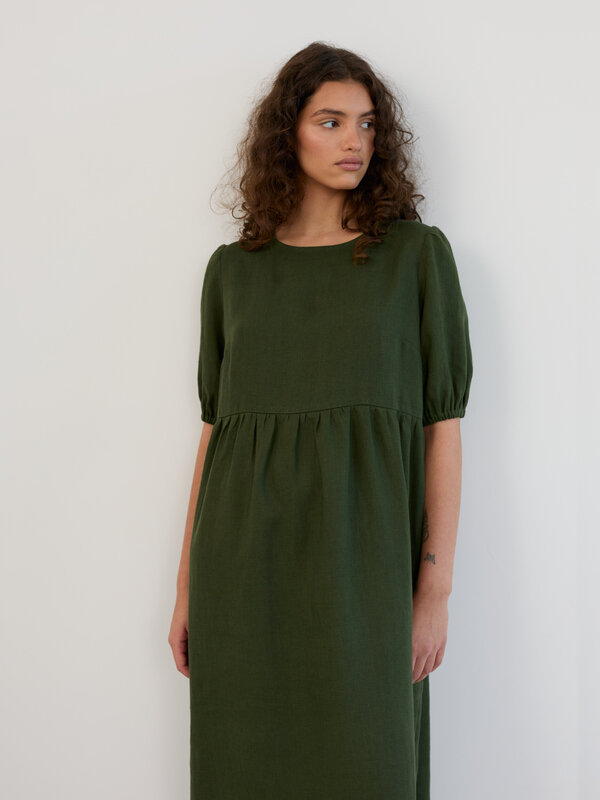 Image 1 of Linen Puff Sleeve Empire Waist Midi Dress in Forest Green ESME from ALBERALKIRK | Handmade Linen Clothing for Women