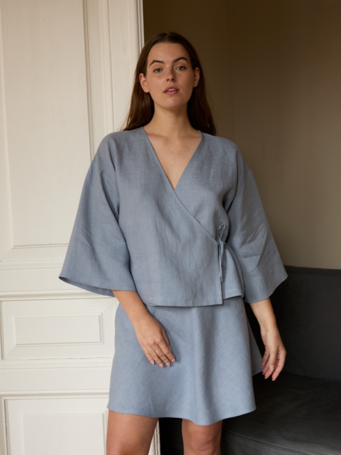 Image 2 of CELESTE linen mini skirt in Vista Blue, featuring an elastic waist and A-line silhouette, from ALBERALKIRK.