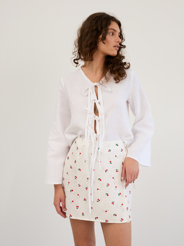 Image 1 of Linen Wrap Mini Skirt in Cherry Print ANNALISE from ALBERALKIRK | Handmade Linen Clothing for Women