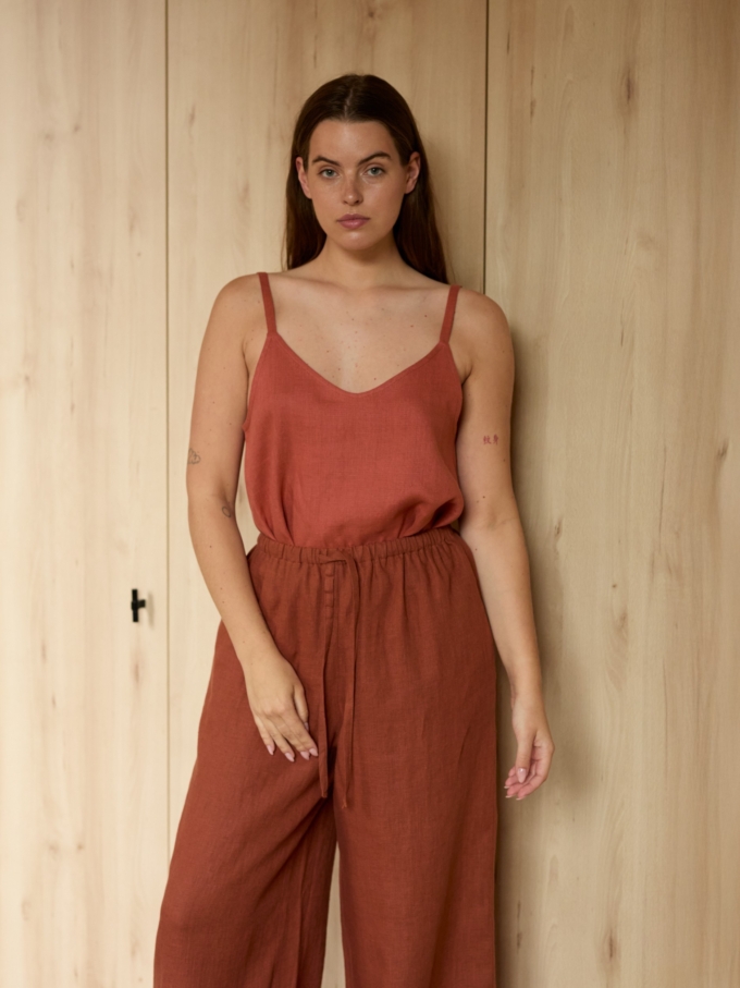 Image 1 of LUCAS wide-leg linen pants in Rust, featuring a drawstring waist and relaxed fit, from ALBERALKIRK.