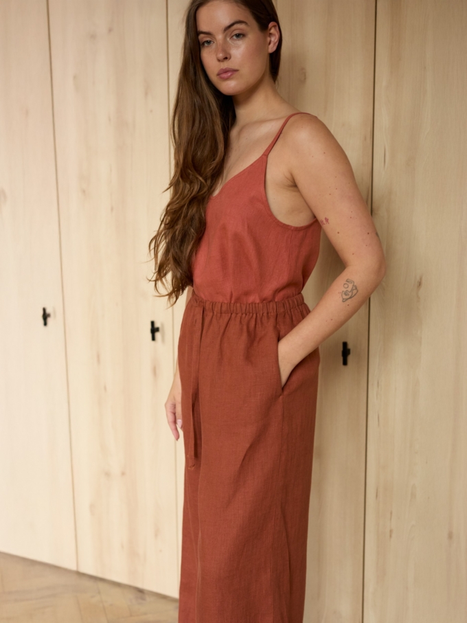 Image 5 of LUCAS wide-leg linen pants in Rust, featuring a drawstring waist and relaxed fit, from ALBERALKIRK.