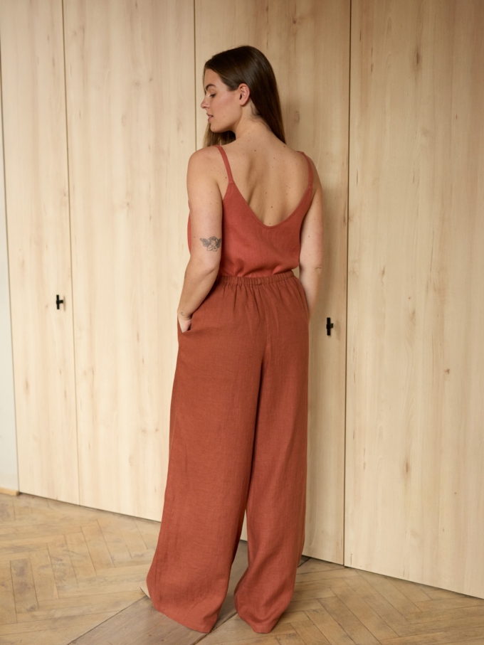 Image 6 of LUCAS wide-leg linen pants in Rust, featuring a drawstring waist and relaxed fit, from ALBERALKIRK.