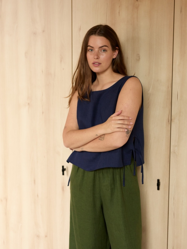 Image 1 of AVERY linen tank top in Navy Blue, featuring adjustable side ties and a scoop neckline, from ALBERALKIRK.