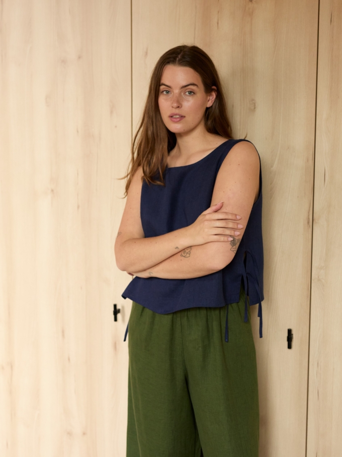 Image 1 of AVERY linen tank top in Navy Blue, featuring adjustable side ties and a scoop neckline, from ALBERALKIRK.