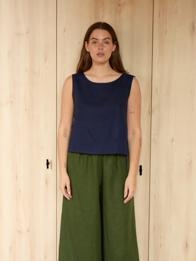 Image 2 of AVERY linen tank top in Navy Blue, featuring adjustable side ties and a scoop neckline, from ALBERALKIRK.