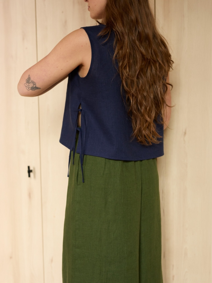 Image 6 of AVERY linen tank top in Navy Blue, featuring adjustable side ties and a scoop neckline, from ALBERALKIRK.