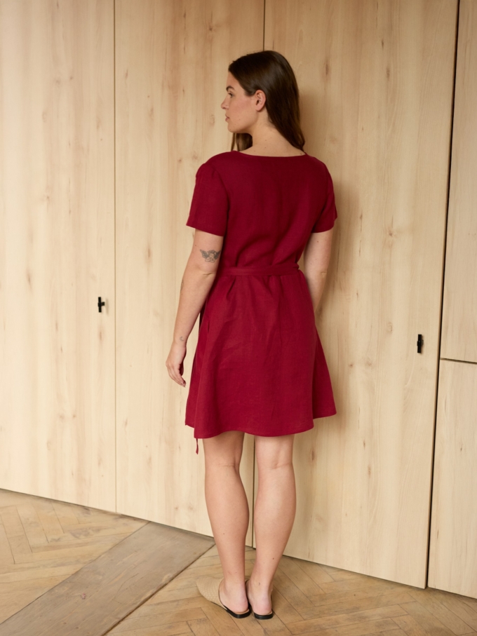 Image 4 of SADIE short sleeve linen wrap dress in Cherry Red, featuring a flattering V-neck and A-line mini skirt, from ALBERALKIRK.