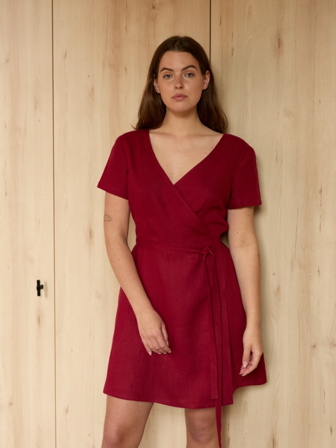 Image 5 of SADIE short sleeve linen wrap dress in Cherry Red, featuring a flattering V-neck and A-line mini skirt, from ALBERALKIRK.